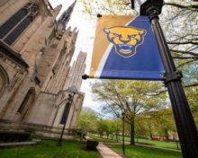Panther flag on lamppost next to heinz chapel 